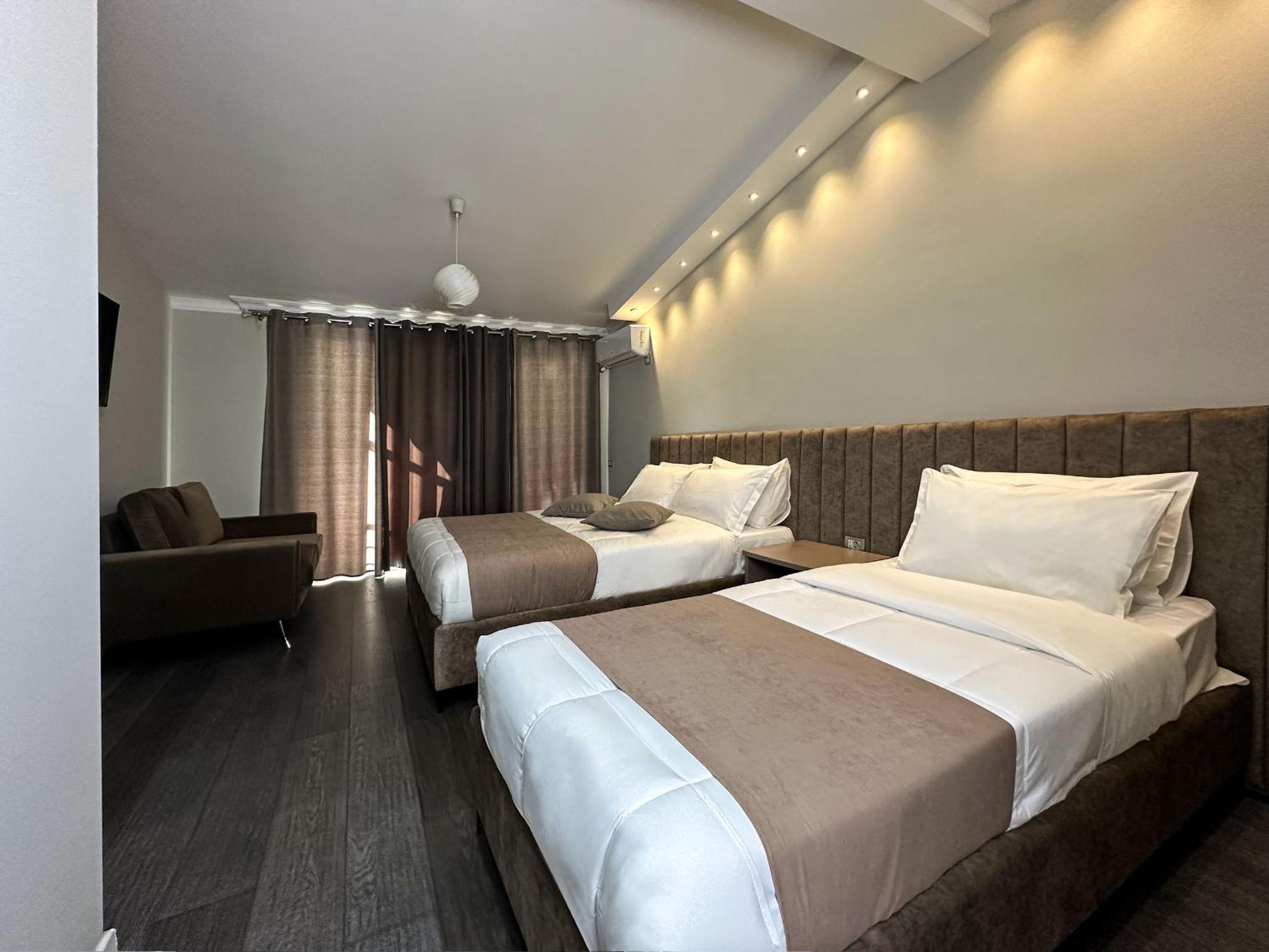 Eden hotel Tirana Buitenkant foto